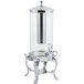 A Bon Chef silver beverage dispenser with a stainless steel ice chamber on a metal stand.