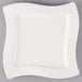 A white Villeroy & Boch square plate with a wavy edge.
