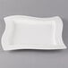 A Villeroy & Boch white square porcelain plate with a curved edge.