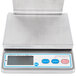 A silver Cardinal Detecto digital portion scale with a screen.