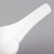 A close-up of a Villeroy & Boch white ceramic dip bowl with a handle.
