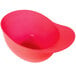 A red plastic mini baseball helmet bowl.
