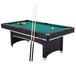 A Triumph Phoenix pool table with cue sticks and balls on it.