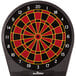 An Arachnid electronic dart board with red and black numbers in the center.