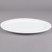 An Alpine white porcelain platter with a rim.