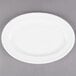 An Alpine White porcelain oval platter with a rim.