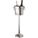 An American Metalcraft silver metal wine bucket stand with bottles in it.