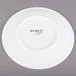 A Libbey alpine white porcelain coupe plate with a black text label.