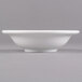 A close up of a Libbey alpine white porcelain fruit bowl with a small rim.