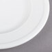 A close-up of a Libbey Alpine White Porcelain Plate with a white rim.