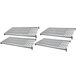A white metal grate with holes for four grey Cambro Camshelving shelves.