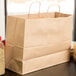 Duro Tote Natural Kraft Paper Shopping Bag with Handles 16" x 6" x 12" - 250/Bundle Main Thumbnail 1