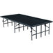 National Public Seating S4832C Single Height Portable Stage with Black Carpet - 48" x 96" x 32" Main Thumbnail 1
