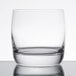 A close up of a Chef & Sommelier clear rocks glass with a white background.