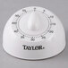A white Taylor kitchen timer with black numbers.