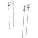 A pair of long metal poles with a metal bar on top.