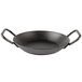 A black Lodge carbon steel frying pan with double loop handles.