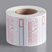 A Cardinal Detecto thermal label roll with white paper and red and blue labels.