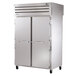 A True Spec Series pass-through heated holding cabinet with two solid doors.