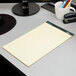 A TOPS Docket notepad on a desk.