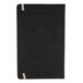 A black rectangular TOPS journal with a circular design on the front.