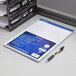 Ampad 20-210 8 1/2" x 11 3/4" Quadrille Ruled White Perforated Writing Pad - 12/Pack Main Thumbnail 1