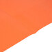 An orange Oxford 2-pocket paper folder with embossed edges.