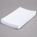 A stack of Oxford white ruled index cards.