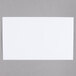 A white rectangle on a gray surface.