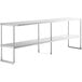 A Regency stainless steel double deck overshelf with metal legs and three shelves.