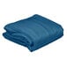 A folded blue Metro shelf cart cover on a white background.