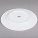 Tuxton ALA-104 Alaska 10 1/2" Bright White Wide Rim Rolled Edge China Plate - 12/Case Main Thumbnail 3