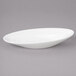 A white Bon Chef oval china bowl.