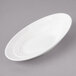 A white oval porcelain bowl.