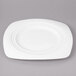 A white Bon Chef soft square porcelain dinner plate.