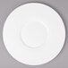 A white Bon Chef bone china plate with a wide white rim.