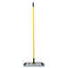 A Rubbermaid HYGEN 18" Microfiber Wet Mop with a yellow handle.