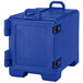 A navy blue plastic Cambro food pan carrier with black handles.