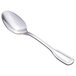 A Walco Luxor stainless steel demitasse spoon with a silver handle and spoon.