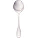 A Walco Luxor stainless steel bouillon spoon with a white handle.