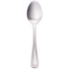 A Walco Pacific Rim stainless steel demitasse spoon with a silver handle.