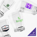 A set of four customizable 5 oz. Acopa Barbary beer tasting glasses, each featuring different printed logos.