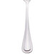 A close-up of a Walco stainless steel bouillon spoon.