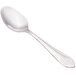 A Walco Meteor stainless steel demitasse spoon with a silver handle and spoon.