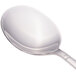 A Walco stainless steel bouillon spoon with a silver handle.