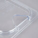 A Carlisle clear plastic hinged lid for a food container.