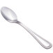 A close-up of a Walco stainless steel teaspoon with a handle.