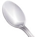 A Walco stainless steel teaspoon with a silver handle and spoon.