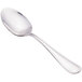 The handle of a Walco stainless steel serving spoon with a white background.
