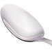 A Walco stainless steel serving spoon with a silver handle.